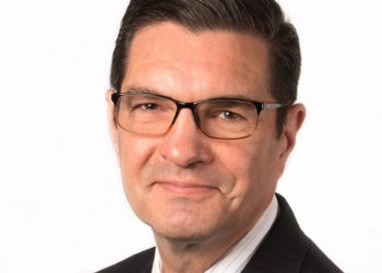 Employees cautiously return to normal work hours