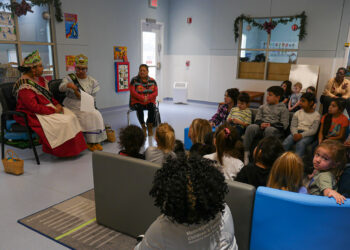 Mvskoke Royalty read to children at MCN Okmulgee Childcare