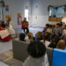 Mvskoke Royalty read to children at MCN Okmulgee Childcare