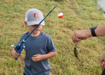 Kids and teens enjoy a day of fishing in Duck Creek competition