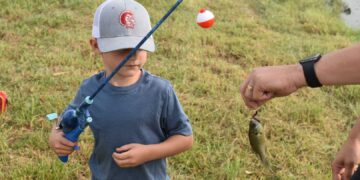 Kids and teens enjoy a day of fishing in Duck Creek competition