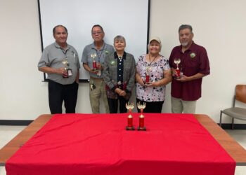 Muscogee Health CHR Employees awarded trophies for excellence by former patient