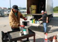 Community members responsibly recycle hazardous waste