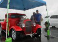 Festival cars rev in the rain