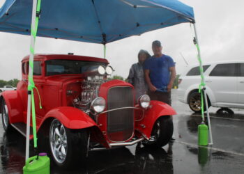 Festival cars rev in the rain